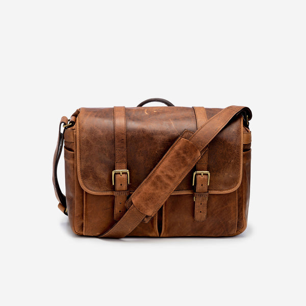 brown leather messenger backpack The ONA Brixton camera and laptop messenger bag